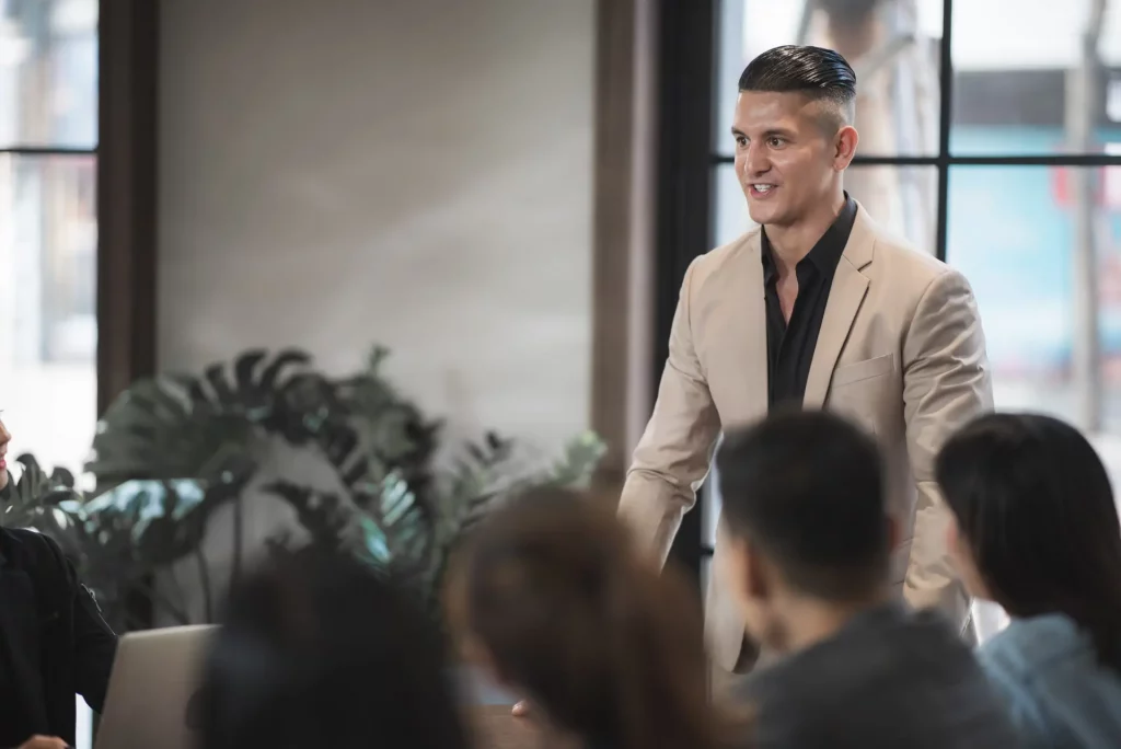 CEO giving a presentation on mental health in leadership