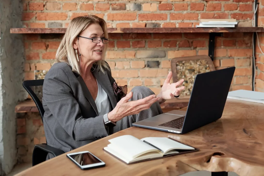 Leadership coach on a video conference call at her desk