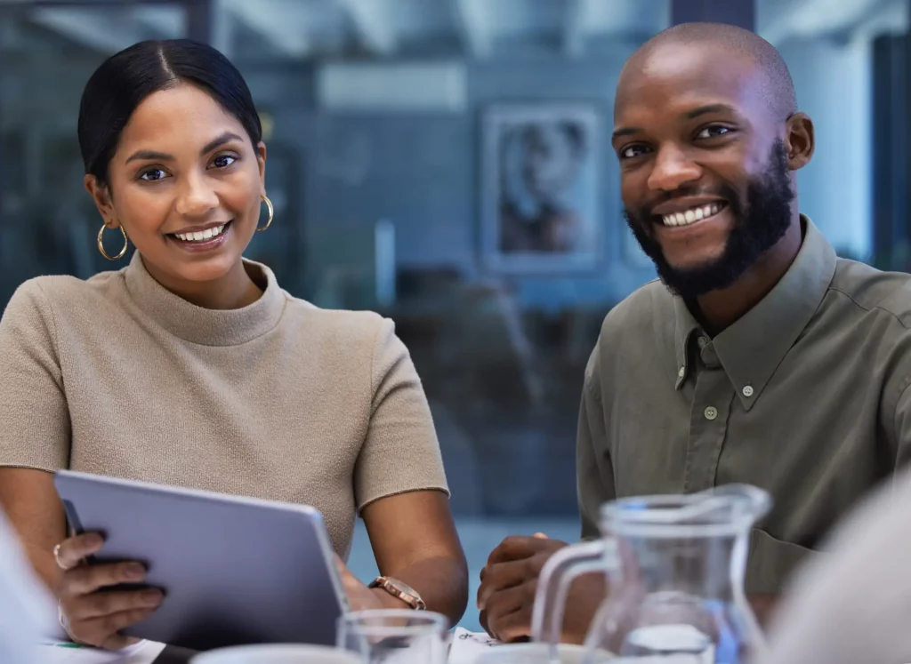 Two people sitting at a table doing career coaching